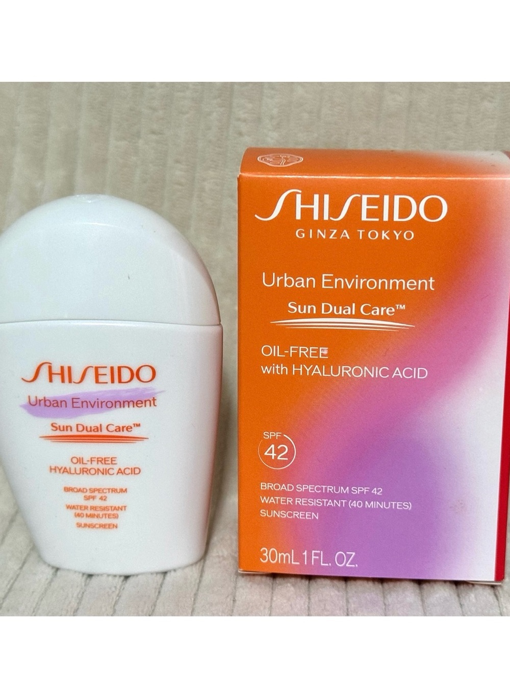 Shiseido Urban Environment Sun Dual Care SPF 42 - White/Orange/Purple